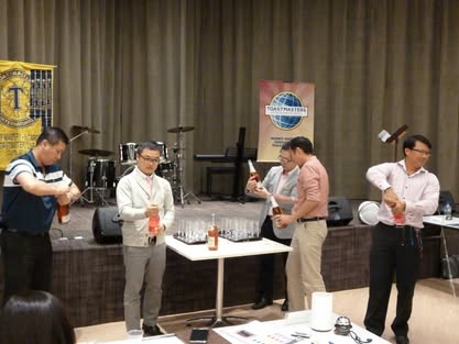 Members opening champagne