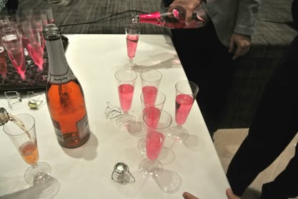 Pink champagne being poured