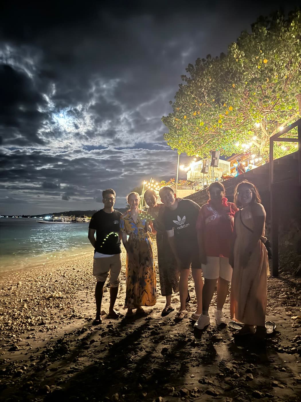 MMTMC mentors together on the beach at dusk in Bali